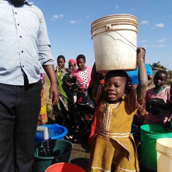 Malawi - Water carrying from borehole Jan 24